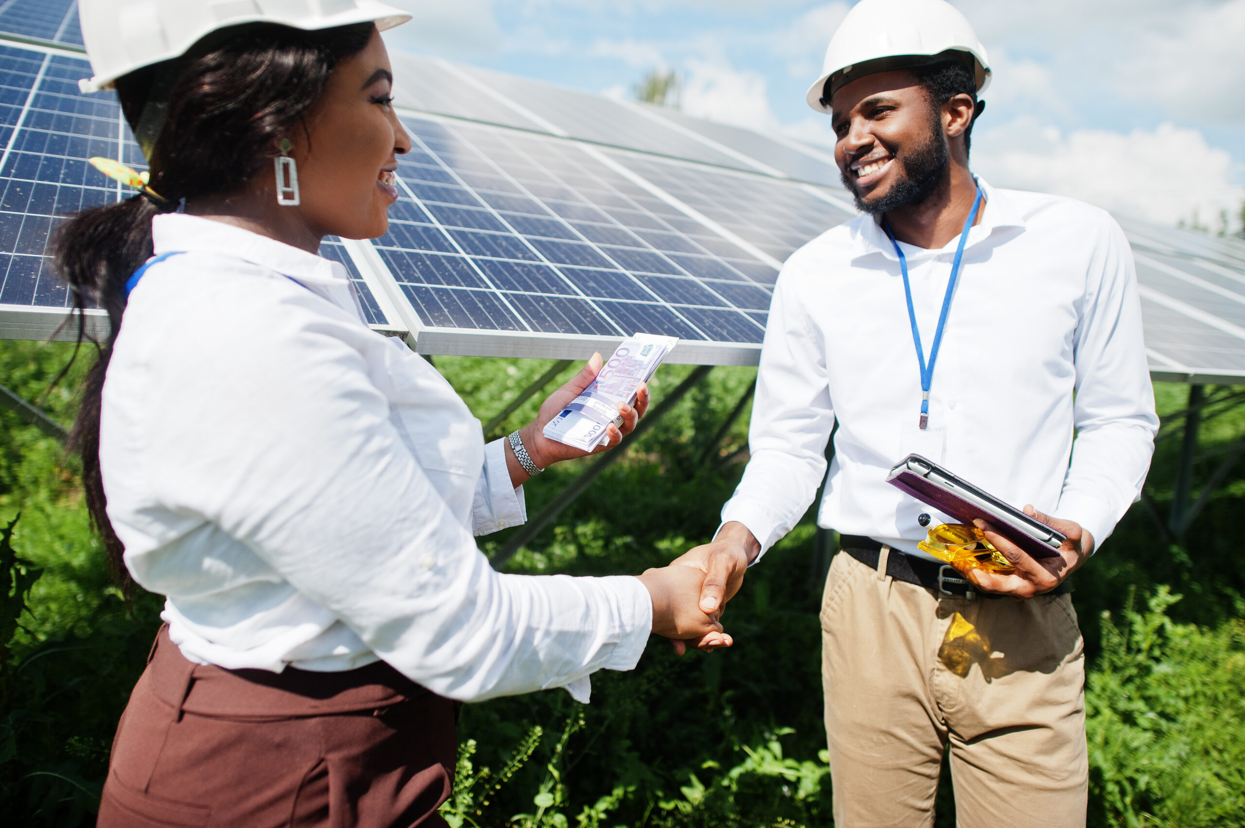 african american technician checks the maintenance of the solar