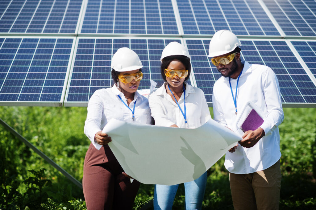 african american technician checks the maintenance of the solar
